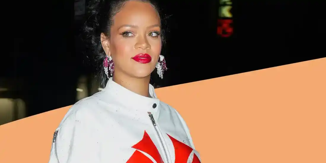 Rihanna Wears A Bump-Baring Jumpsuit To Pharrell’s First Louis Vuitton Show