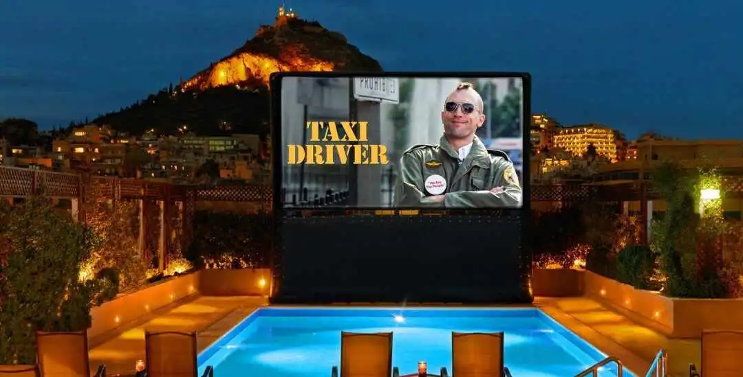 Hotel Grande Bretagne: Summer movie nights overlooking the hotel pool and a perfect view of Lycabettus