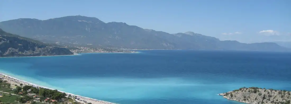 "Families enjoying swimming at Psatha Beach Saronic Gulf"