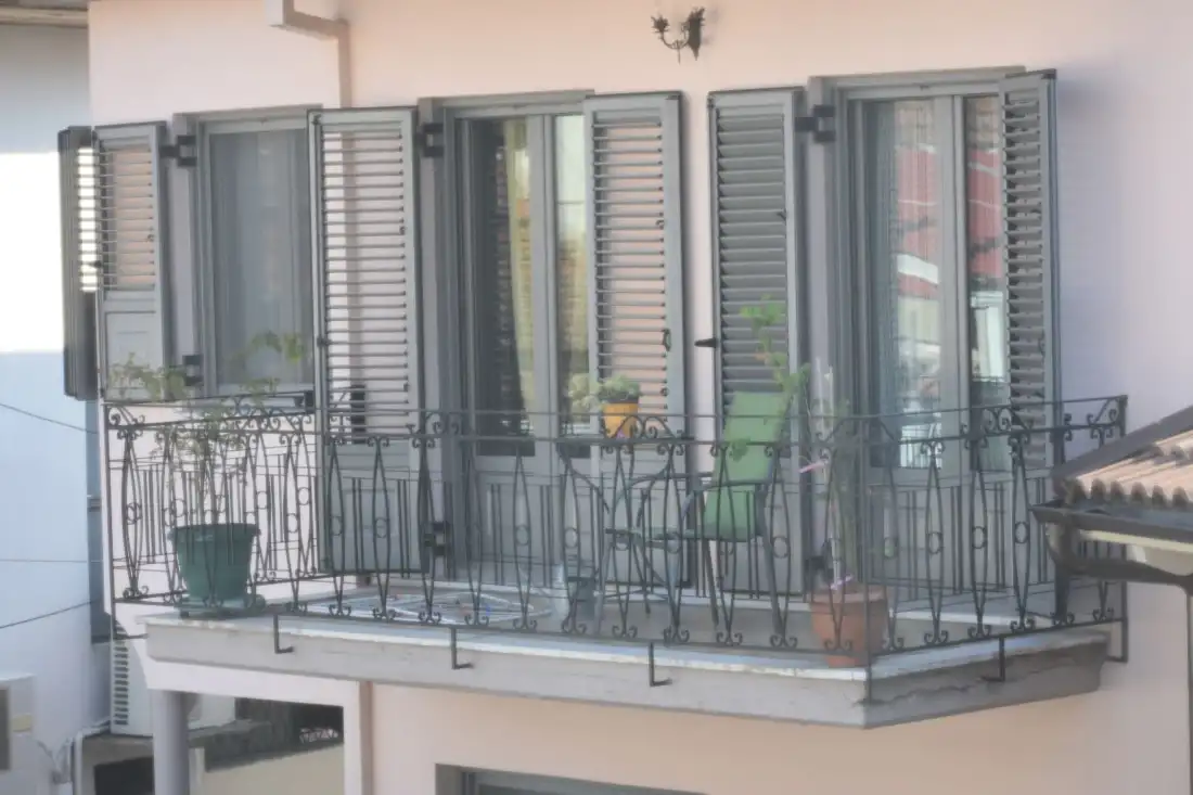 Homemade pies and local food on wooden table in Zagorohoria Greece