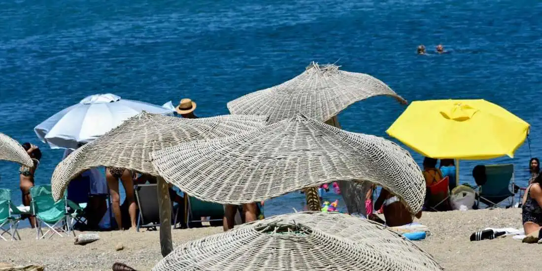 Traditional Tinos dishes with cheese, sun-dried tomatoes, and wine